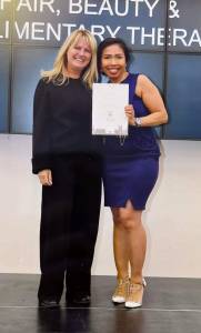Ani Soleha (Indo Soul Hair) receiving award for Wella Student of the year in 2022 as part of Level 3 VTCT SVQ in Hair Dressing